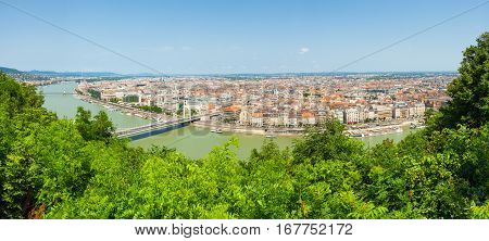 Panoramic View Of Dunabe River With Bridge Connecting Buda And Pest In Budapest, Hungary