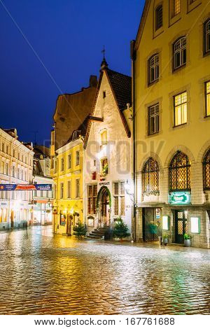 Tallinn, Estonia - December 2, 2016: Vanaturu Street In Historical Centre Of Old Town In Evening Illumination. Traditional Medieval Houses On Old Narrow Street. Tallinn, Estonia