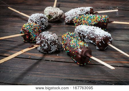 Chocobanana - traditional dessert in Guatemala of frozen banana dipped into hot chocolate.