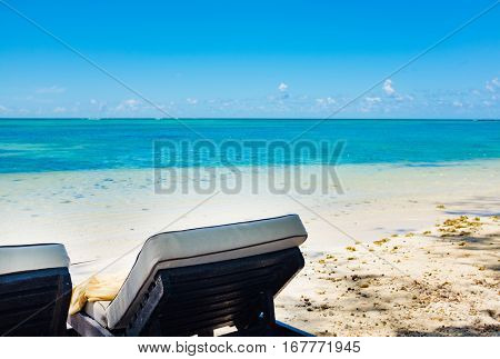 empty deckchairs on the beach . Mauritius island