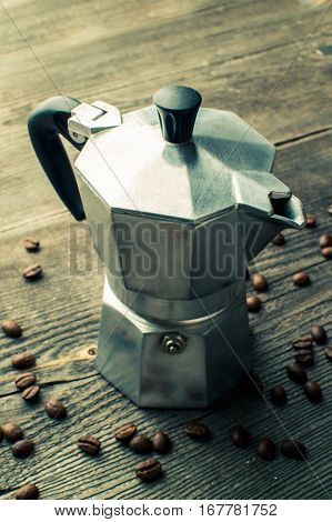 Silver geyser coffee maker. Device for kitchen.