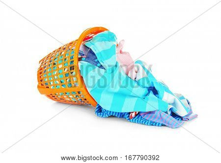 Clothes in  basket on white background