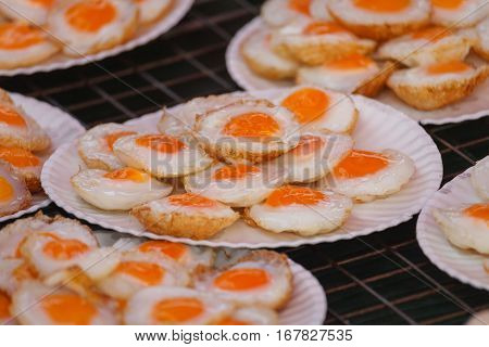 Fried quail egg or partridge egg friedThai street food