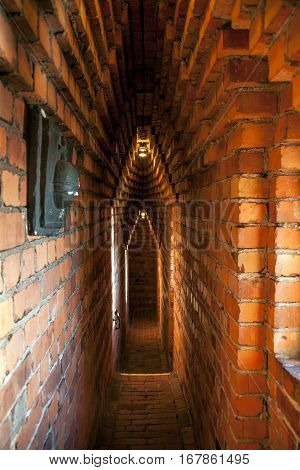 Narrow brick corridors inside the Stockholm's City Hall Tower Sweden