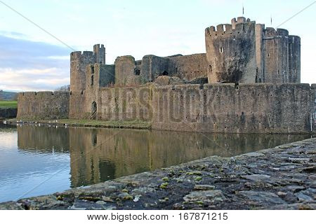 Caerphilly Castle reflected in the lake, Wales