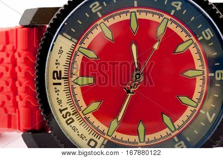 men's watch in red on a white background