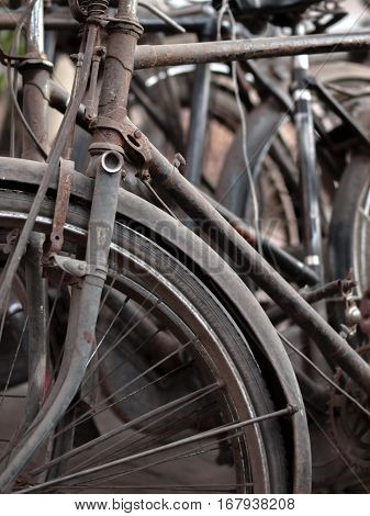 ABSTRACT SHOT OF OLD RUSTY BICYCLE PARTS