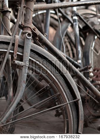 ABSTRACT SHOT OF OLD RUSTY BICYCLE PARTS