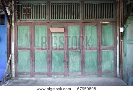 Old wooden door front view and stock photo