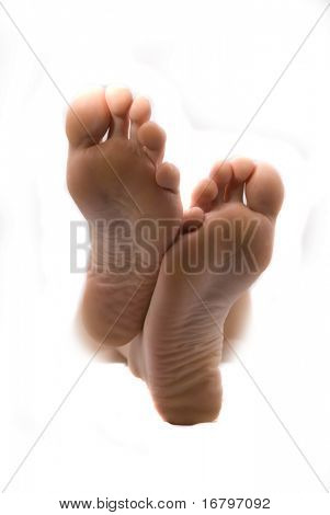 Piedi di donna bella. Isolated on white background