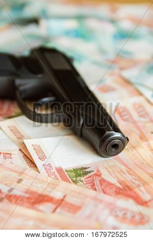 Black Gun Lies On The Russian Big Money