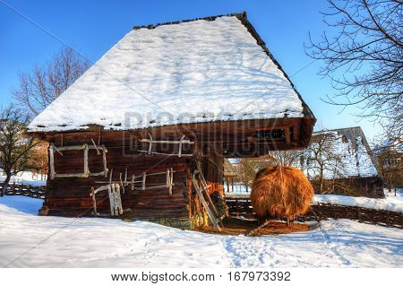 Traditional house stable of the village museum from Baia Mare, in winter season