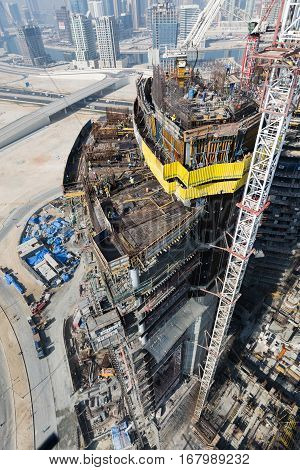 United Arab Emirates Dubai 05/21/2015 Damac Towers Dubai by Paramount construction and building ariel views with cityscape background