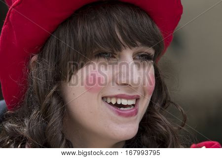 CAGLIARI, ITALY - June 1, 2014: Sunday at La Grande Jatte public gardens - Sardinia - portrait of a beautiful smiling girl in Victorian costumes