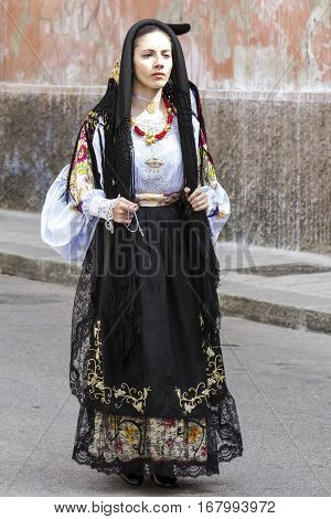 CAGLIARI, ITALY - May 1, 2014: 358 Religious Procession of Sant'Efisio - Sardinia - portrait of a beautiful woman in traditional Sardinian costume