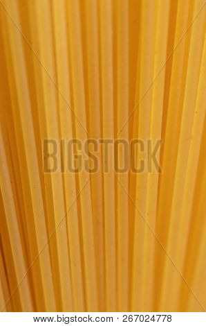 A Bouquet Of Spaghetti On A Dark Background Near