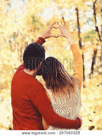 Couple In Love Show Heart Sign With Fingers