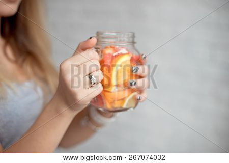 Close-up Happy Woman With Glass Of Fresh Summer Lemonade With Straw. Caucasian Young Girl 20-25 Year