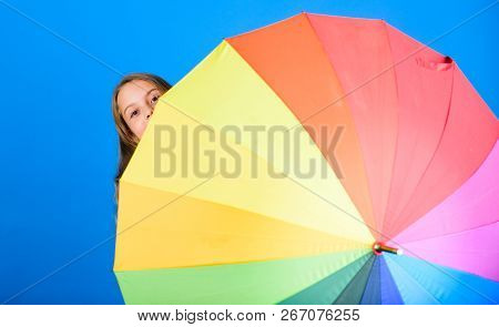 Color Your Life. Girl Cheerful Hide Behind Umbrella. Colorful Umbrella Accessory. Weather Forecast C