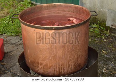 Copper Pot With Octopus Cooking Inside In The Becerrea Octopus Fair. Kitchen, Food, Travel, Vacation