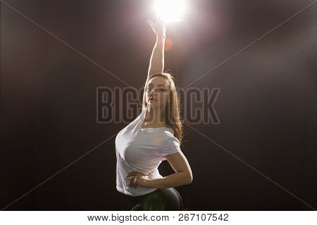Hip-hop, Jazz-funk, Tecktonik, Waacking, Trance And Street Dances Concept - Young Woman Dancing Jazz
