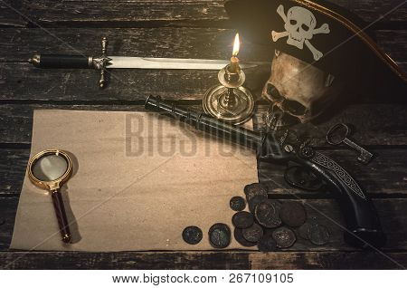 Pirate Treasure Map With Copy Space, Pirate Captain Hat, Coins, Magnifying Glass, Human Skull, Muske