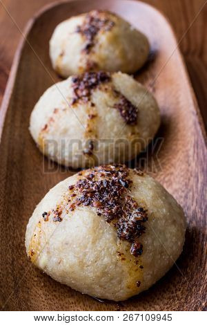 Icli Kofte / Boiled Kibbeh / Quibe With Butter Sauce.