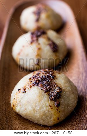 Icli Kofte / Boiled Kibbeh / Quibe With Butter Sauce. Turkish Or Arabian Food Culture