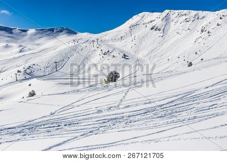 View Of The Mountain Slopes With Ski Slopes In The Pyrenees, Andorra. On The Slopes Of The Prepared 