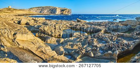 Panorama Of Unapproachable Coastline Of Dwejra With Sharp Limestone Boulders, Small Natural Pools An