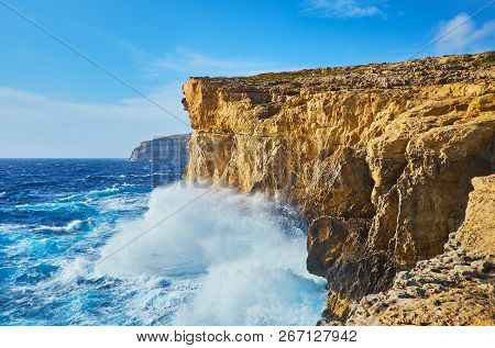Watch The Foaming Waves Of The Storm From The Rocky Cliff Of San Lawrenz Coast At Former Azure Windo