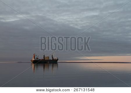 Resupply Cargo Barge On The Waters Of Nunavut Near The Community Of Baker Lake In The Kivalliq Regio