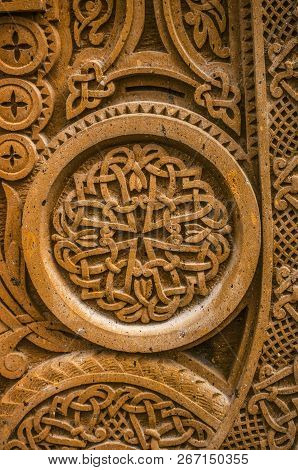 Oshakan,armenia,19 Februar,2018:round Ornament With Intertwining Pattern Of Engraved Strips Placed I