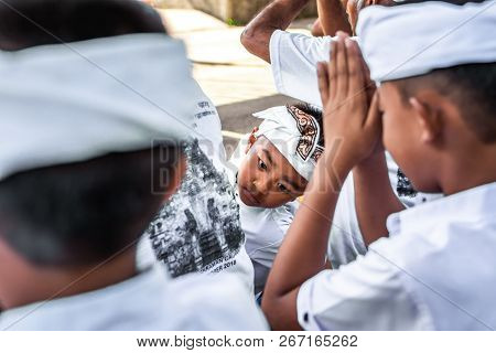 Bali, Indonesia - October 9, 2018: Balinese Boy In Traditional Clothes On Culture Ceremony, Ubud, Gi