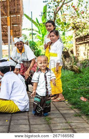 Bali, Indonesia - October 9, 2018: Balinese Boy In Traditional Clothes On Culture Ceremony, Ubud, Gi