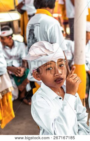 Bali, Indonesia - October 9, 2018: Balinese Boy In Traditional Clothes On Culture Ceremony, Ubud, Gi