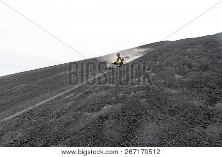 Cerro Negro, Nicaragua - April 26, 2016: Tourist Is Volcano Boarding From Cerro Negro Volcano, Nicar