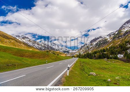 Road Amoung Snowy Alps Mountains, Fluelapass, Davos,  Graubuenden Switzerland