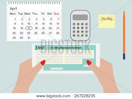 Woman Hands Holding The Income Tax Form 1040. A Woman Signing Or Filling The Form. A Calendar, A Pen