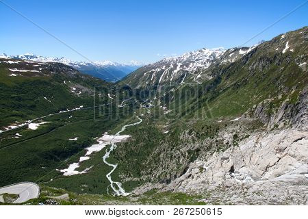Rhone glacier, source of Rhone river, melting and retreating due to global warming. Rhone glacier is loosing up to 2 meters in length every year.