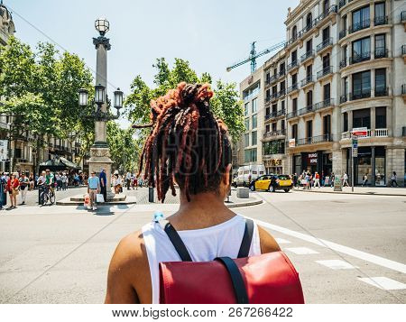 Barcelona, Spain - Jun 1 2018: Pov At People Crossing Street In Central Barcelona Center To The Icon