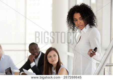 Black Female Mentor Make Presentation On Flipchart Training Empl