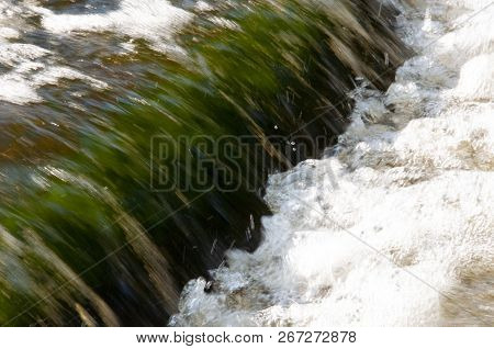 Waterfalls In Summer. Clear And Fresh Water Are Falling Down. Tints Of Green And White. Fotography M