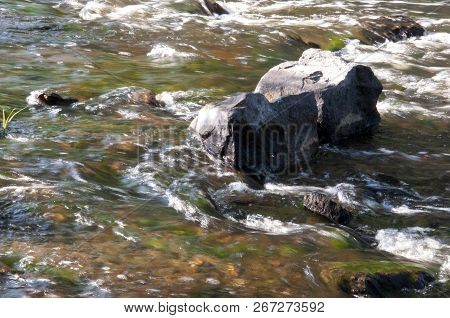 Waterfalls In Summer. Clear And Fresh Water Are Falling Down. Tints Of Green, Blue And White. There 