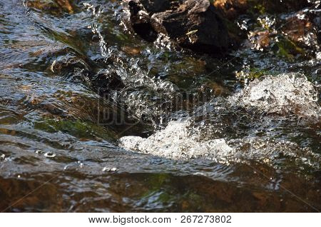 Waterfalls In Summer. Clear And Fresh Water Are Falling Down. Tints Of Green, Blue And White. There 