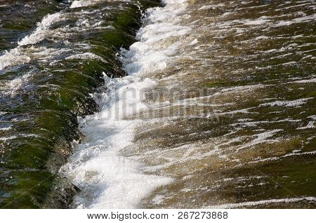 Waterfalls In Summer. Clear And Fresh Water Are Falling Down. Tints Of Green, Blue And White. There 