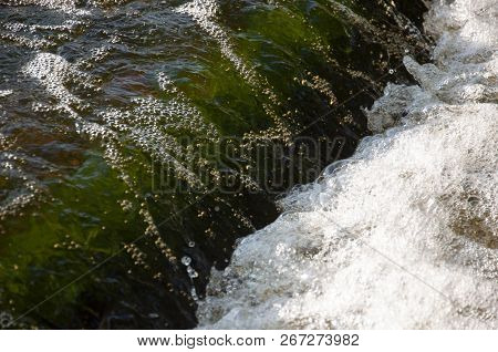 Waterfalls In Summer. Clear And Fresh Water Are Falling Down. Tints Of Green, Blue And White. There 