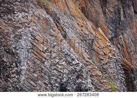 Arctic rocks background - basalt or touchstone formations
