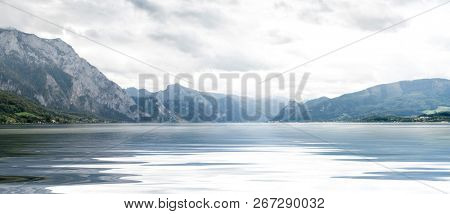 Panoramic view of amazing landscape of wide lake and mountains around