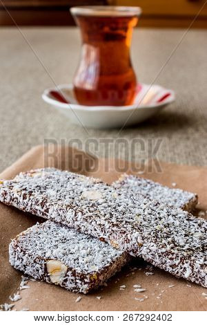 Turkish Dessert Cezerye With Walnut, Coconut Powder And Tea
